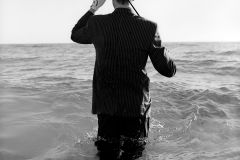 Don with golf club in ocean, Palm Beach, Florida, 1997